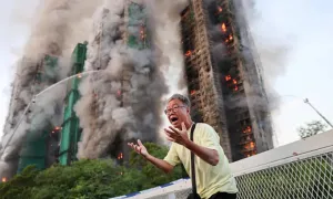 Sống sót trong thảm kịch cháy chung cư Hong Kong nhờ khăn ướt